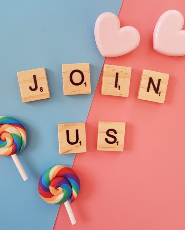 Quirky image with lollipops, love heart candies, and wooden scrabble letters spelling out join us to illustrate legally collect email addresses