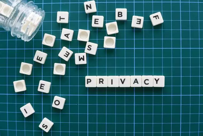 Privacy spelt out in scrabble letters on a grid background